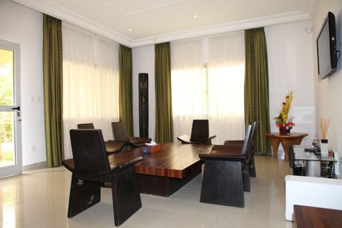 Deluxe Villa, 1 Bedroom | Living area | Flat-screen TV