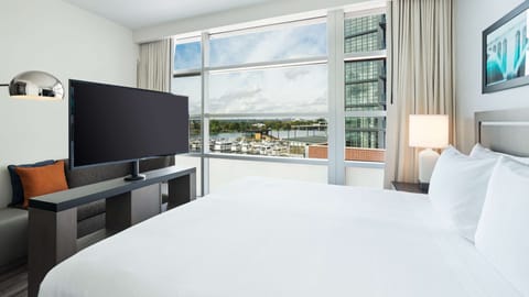 Room, 1 King Bed (River Front) | In-room safe, desk, laptop workspace, blackout drapes