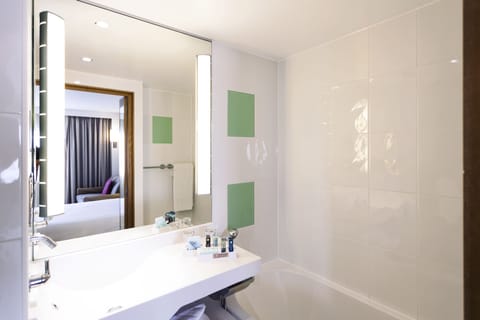 Deep soaking tub, eco-friendly toiletries, hair dryer, towels