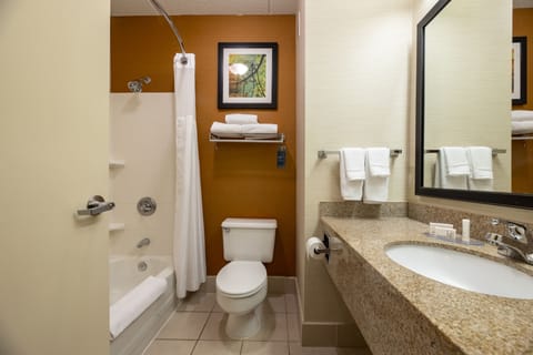Room, 2 Queen Beds | Bathroom | Combined shower/tub, free toiletries, hair dryer, towels