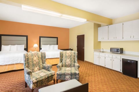 Suite, 2 Queen Beds, Microwave | Desk, iron/ironing board, rollaway beds, free WiFi