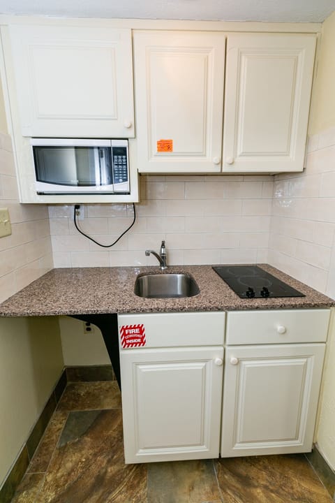 Room, Multiple Beds, Non Smoking, Ocean View | Private kitchenette | Fridge, microwave