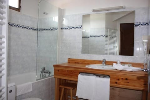 Combined shower/tub, free toiletries, hair dryer, bathrobes