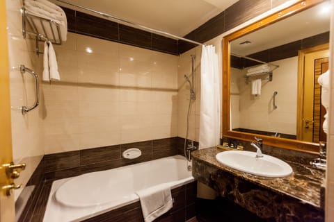 Shower, free toiletries, hair dryer, slippers