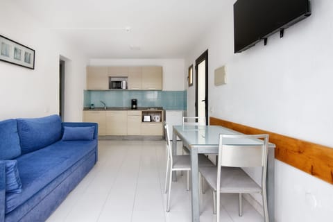 Apartment, 1 Bedroom (3 People) | Living area | Flat-screen TV