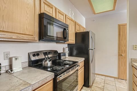 Condo, 2 Bedrooms | Private kitchen | Microwave, oven, dishwasher, coffee/tea maker