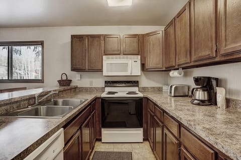 Condo, 1 Bedroom | Private kitchen | Full-size fridge, microwave, oven, stovetop