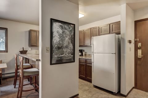 Condo, 1 Bedroom | Private kitchen | Full-size fridge, microwave, oven, stovetop