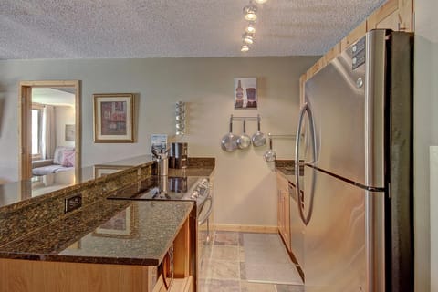 Condo, 1 Bedroom | Private kitchen | Full-size fridge, microwave, oven, stovetop