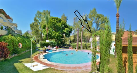 Our apartment on the right side with the swimming pool just beside