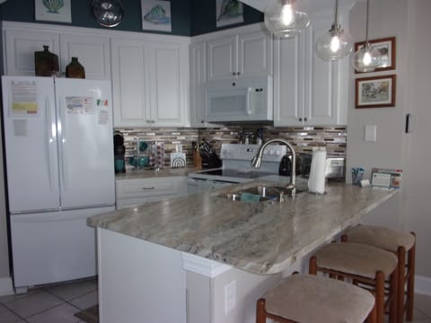 Bar stools at the counter for additional seating.
