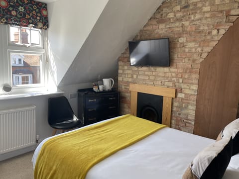 Basic Double Room | Blackout drapes, iron/ironing board, free WiFi, bed sheets