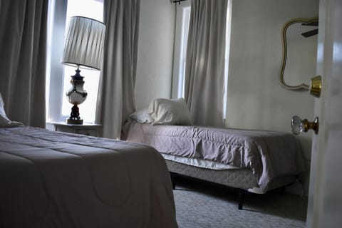 Suite 202, 2 Bedrooms, Non Smoking | Premium bedding, pillowtop beds, individually decorated