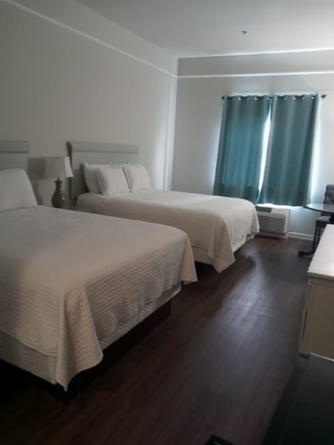 Standard Room, 2 Queen Beds | Premium bedding, desk, iron/ironing board, free WiFi