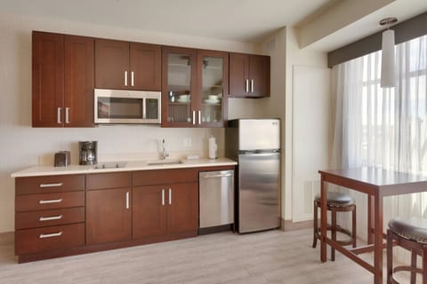 Executive Studio, 1 King Bed | Private kitchen | Full-size fridge, microwave, stovetop, dishwasher