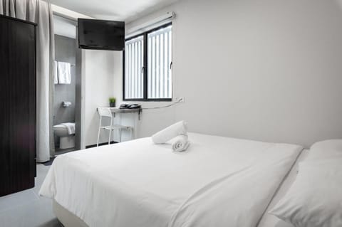 Deluxe Queen Room | Down comforters, desk, iron/ironing board, free WiFi