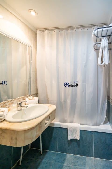 Bathtub, hair dryer, towels