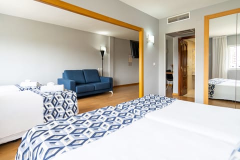 Quadruple Room | Minibar, in-room safe, free WiFi, bed sheets