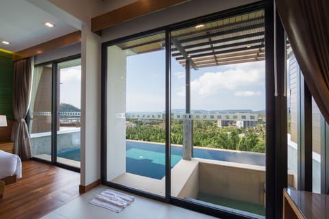 Pool Villa Sea View  | Minibar, in-room safe, desk, blackout drapes