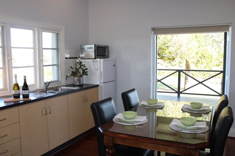 Upper Reach Spa Cottage | Private kitchenette | Full-size fridge, microwave, oven, stovetop