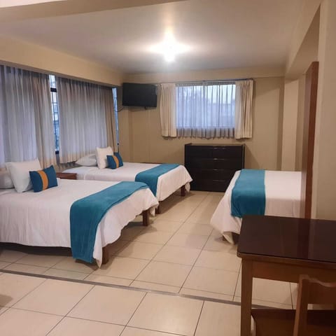 Family Triple Room, Multiple Beds, Ensuite | In-room safe, desk, iron/ironing board, free WiFi