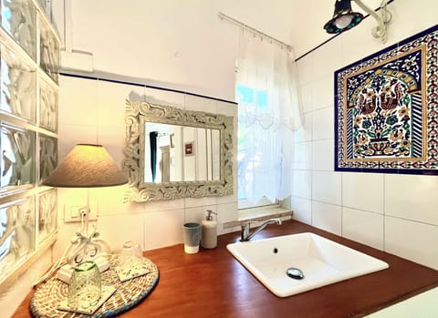 Luxury Triple Room, Terrace | Down comforters, minibar, in-room safe, individually decorated