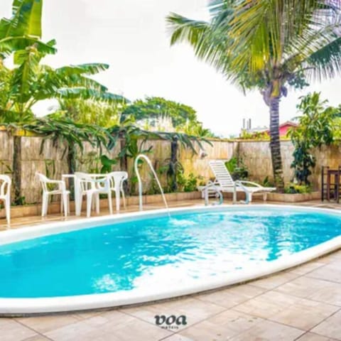 Outdoor pool, open 9:00 AM to 10:00 PM, sun loungers