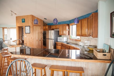 Cottage, 3 Bedrooms | Private kitchen | Full-size fridge, microwave, coffee/tea maker