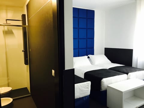 Triple Room | Premium bedding, minibar, in-room safe, desk