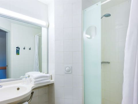 Shower, eco-friendly toiletries, hair dryer, towels