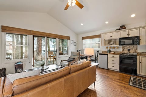 Deluxe River Cottages  (202162546) | Living area | Flat-screen TV, fireplace