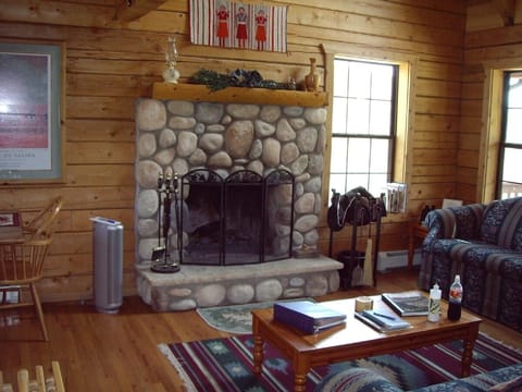 Large wood-burning F/P to warm you now with efficient insert