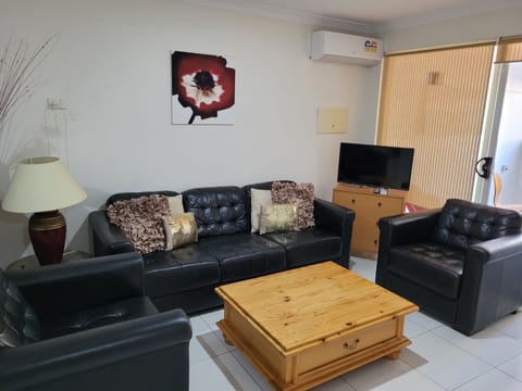 Standard Apartment, 2 Bedrooms | Living area | 30-inch flat-screen TV with digital channels, TV