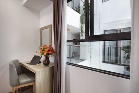 Deluxe Room, Balcony, Double/Twin Bed | Living area | LCD TV