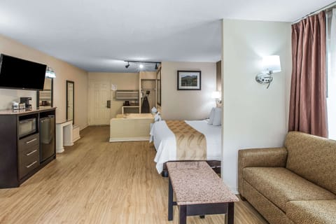 Suite, 1 King Bed, Non Smoking, Fireplace (No Pets) | Premium bedding, desk, iron/ironing board, rollaway beds