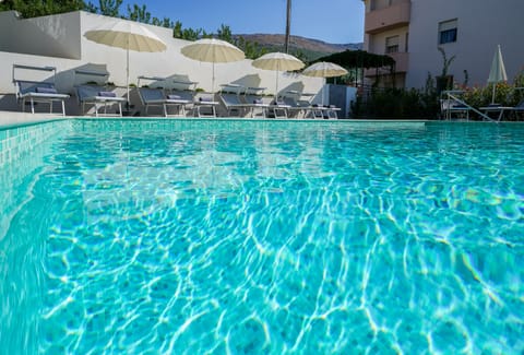 Outdoor pool, open 8:30 AM to 10:00 PM, pool umbrellas, sun loungers