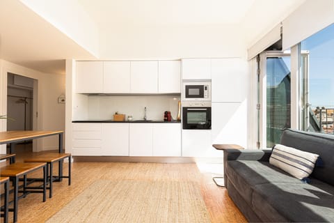 Apartment, Balcony, City View | Private kitchen | Fridge, microwave, stovetop, dishwasher