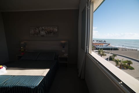 Double Room, Sea View | Minibar, desk, cribs/infant beds, free WiFi