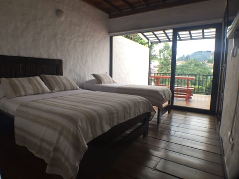 Triple Room, Balcony | 1 bedroom, in-room safe, iron/ironing board, free WiFi