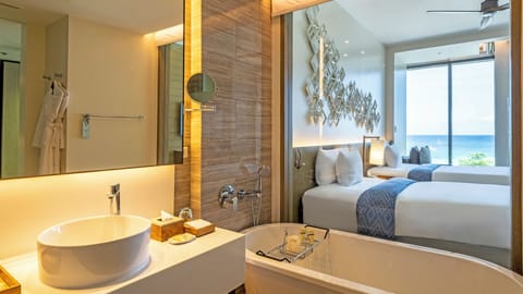 Deluxe Seaview | Bathroom | Separate tub and shower, free toiletries, hair dryer, bathrobes