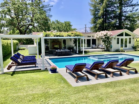 Large backyard with pool and spa