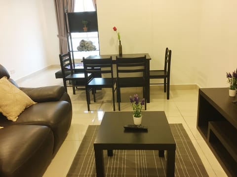 Studio, 1 Bedroom | Living room | Flat-screen TV