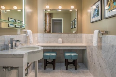 Hospitality Suite | Bathroom | Shower, hair dryer, towels