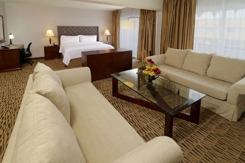 Suite, 1 King Bed | In-room safe, blackout drapes, iron/ironing board