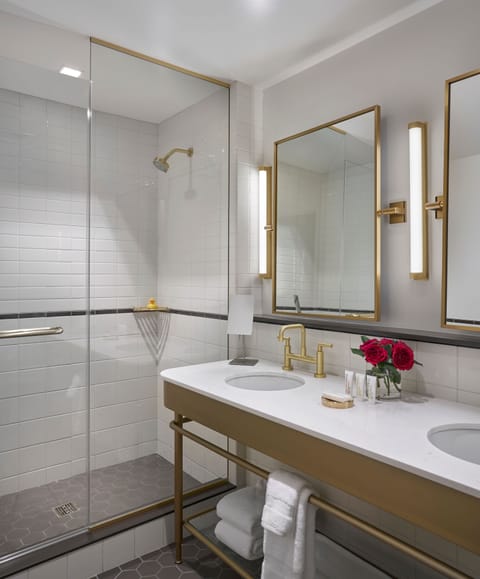 Suite, 1 King Bed, Corner | Bathroom | Eco-friendly toiletries, hair dryer, bathrobes, towels