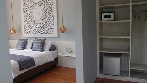 Villa, 1 Bedroom, Garden View | Minibar, in-room safe, desk, soundproofing