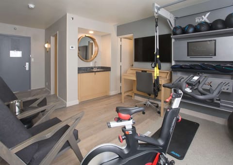 Suite, 1 Bedroom (Fitness Suite) | In-room safe, desk, blackout drapes, iron/ironing board