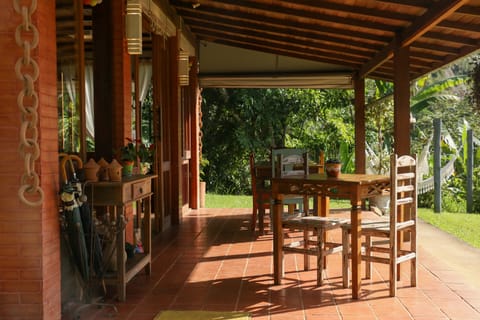 Lunch, dinner served; international cuisine, garden views 