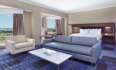 Suite, 1 King Bed | Premium bedding, in-room safe, desk, iron/ironing board