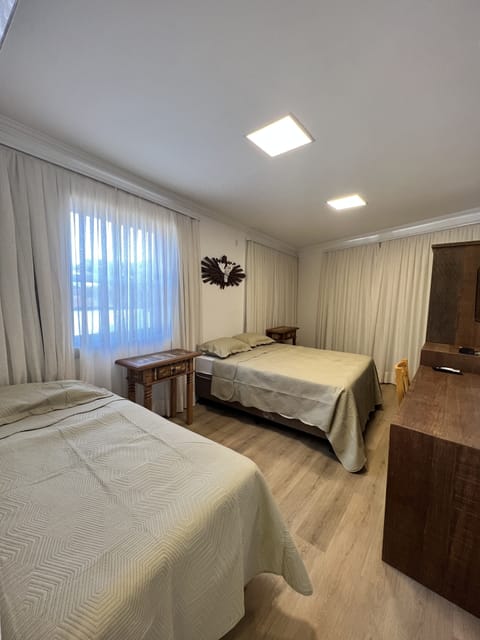 Deluxe Triple Room | Minibar, iron/ironing board, free WiFi, bed sheets